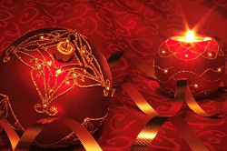 close up look at a red Christmas ornament with gold designs