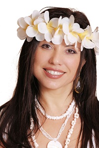 face of a Hawaiian women wearing flowers in her hair ready to play luau party games